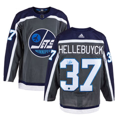 Connor Hellebuyck Signed Winnipeg Jets Reverse Retro adidas Jersey