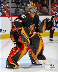 Pre-Order - Dustin Wolf Autographed Calgary Flames Alternate 8x10 Photo